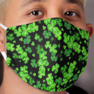 Green Clover Lucky Irish Shamrocks over black background Cloth Face Mask