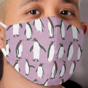 Happy Penguins and Snow on a purple background Cloth Face Mask