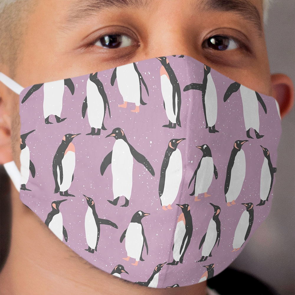 Happy Penguins and Snow on a purple background Cloth Face Mask